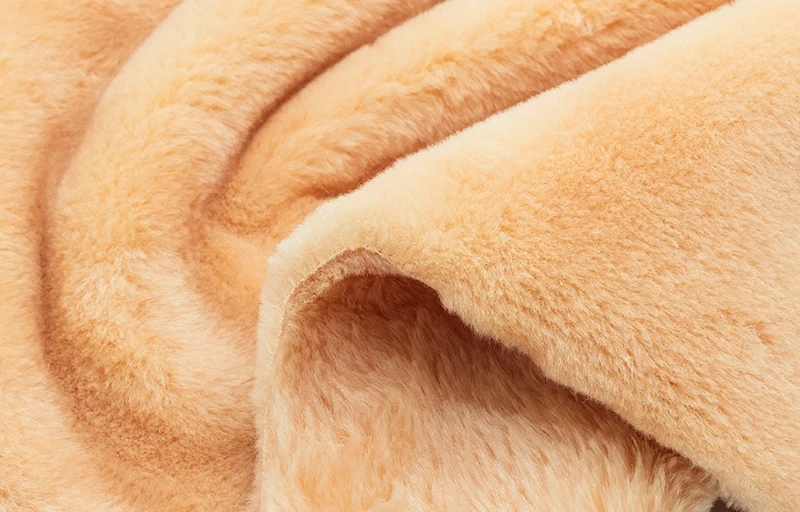 Premium Faux Rabbit Fur fabric with ultra-soft texture and non-shedding fibers for luxury coats.